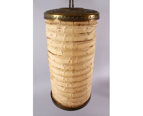 A 19TH CENTURY OTTOMAN BRASS OPENWORK EXTENDING LAMP, the top and base with openwork, opening with a pleated textile folding 