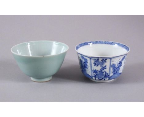 TWO CHINESE PORCELAIN BOWLS, one kangxi style with panel decoration of flora, the base wwith a six character mark, the other 
