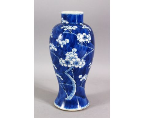 A 19TH CENTURY CHINESE BLUE &amp; WHITE PORCELAIN PRUNUS VASE - decorated with a blue ground and with prunus decoration - the