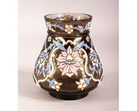 AN ISLAMIC AMBER GLASS VASE with enamel decoration, 12cm high.