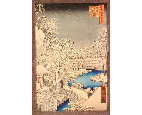 A JAPANESE WOODBLOCK PRINT OF A SNOW LANDSCAPE - depicting a native snowy scene in Japan - artist signed, framed 58cm x 47cm
