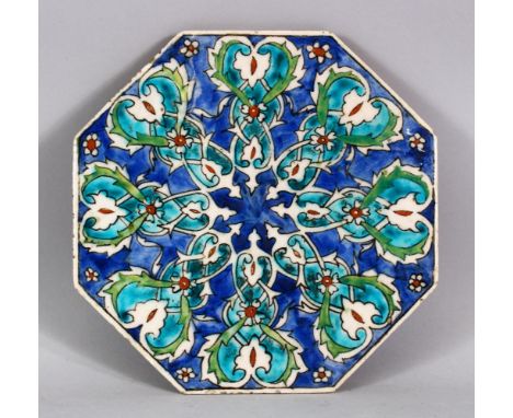 A 19TH CENTURY TURKISH OTTOMAN KUTAHIYA POTTERY TILE, 22cm square.