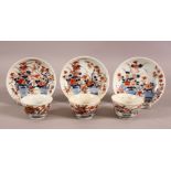 A MIXED LOT OF THREE CHINESE IMARI TEA BOWLS & SAUCERS - Each decorated in similar style with flora