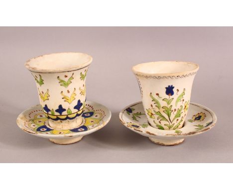 TWO TURKISH CUPS &amp; SAUCERS - with floral motif decoration  (4)