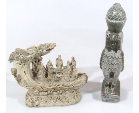 A 20thC Chinese resin figure group, formed as many scholars standing in flowing robes, in a cut out section of a tree trunk, 