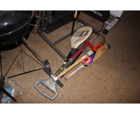 A hockey stick; pogo stick; cricket bat etc.