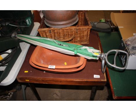 Two terracotta dishes; and a shooting stick