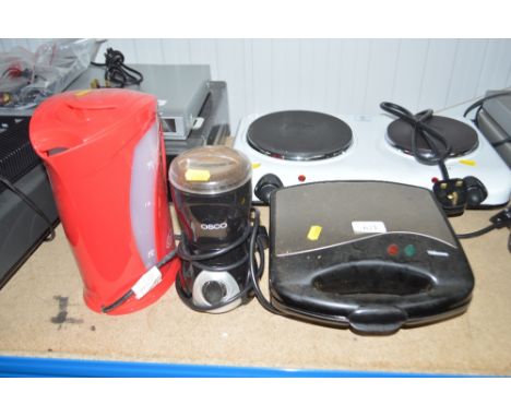 A Tristar sandwich toaster; a coffee grinder and a kettle 
