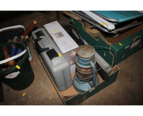A box containing a Hurricane lamp; tennis racket; wall lights; a laser level etc. 