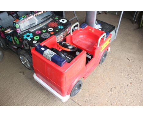 A child's battery operated fire engine