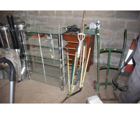 A quantity of long handled gardening tools etc.