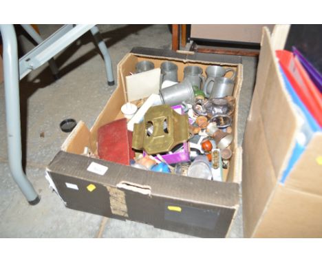 A box full of various sundry items to include; digital cameras; folk-art style bell; pewter tankards