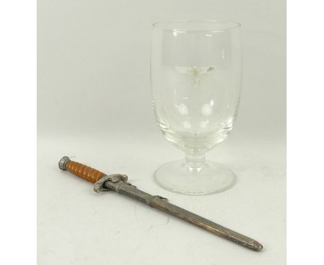 A miniature Heer Army dagger by E & F Horster, Solingen, and a beer glass decorated with the Nazi eagle, 13cm high. 