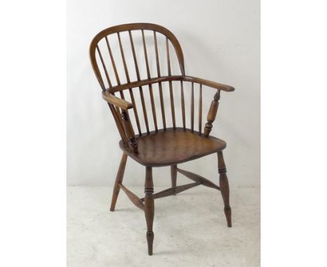 A Windsor ash and elm chair, with low stick back, with H stretcher, 94cm high. 
