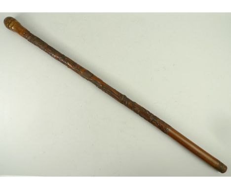 A bamboo sword stick, carved with Moghul figures, 85cm. 