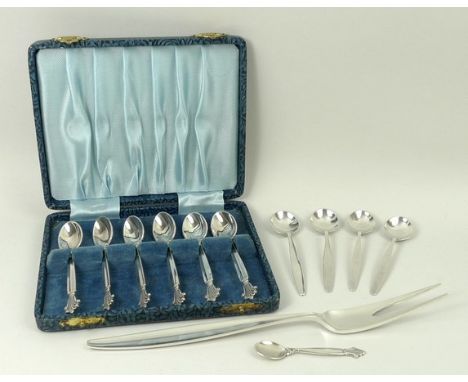 A set of six silver Georg Jensen demi tasse coffee spoons decorated in the 'Acanthus' pattern, cased, an 'Acanthus' pattern s