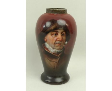 A porcelain vase, late 19th century, painted with a portrait of a fisherman smoking a pipe, with silver rim, London 1898, H W