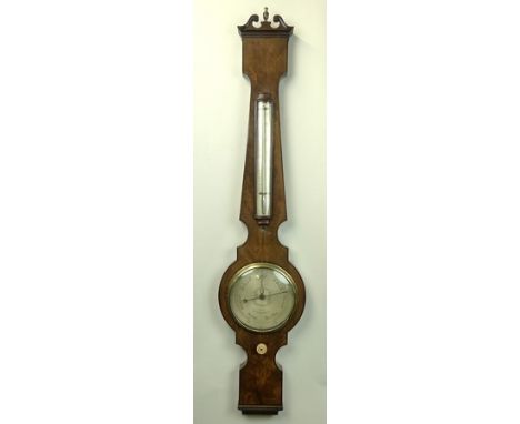 A Regency mahogany wheel barometer by Loof of Tunbridge Wells, with thermometer, the broken arch pediment centred by a gilt b