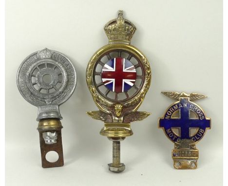 A group of car mascots, comprising; a Norman Cross Motor Club 1933, a Royal Automobile Club Associate, and The Royal Automobi