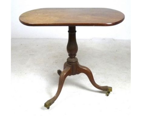 A 19th century mahogany tea table with rectangular top and tripod base, 84 by 60 by 73cm high. 