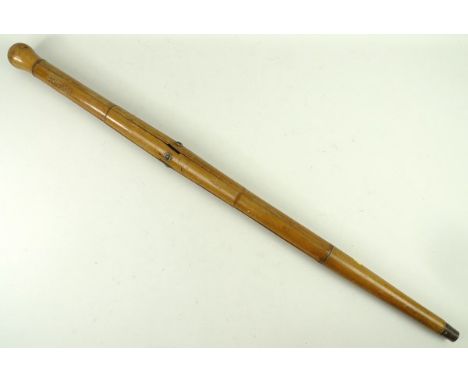 A Field's Patent campaign stand stick, number 1661/77, 84cm long. 