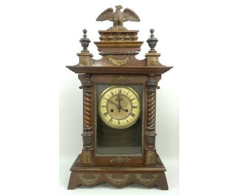 A German wooden cased bracket clock, late 19th century, brass dial with enamel chapter ring bearing Roman numerals, eight day