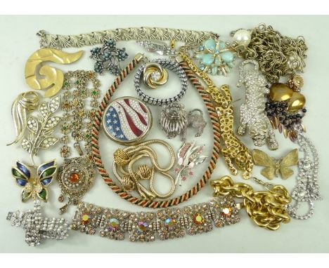 A quantity of costume jewellery including a paste set panther brooch, enamel floral necklace, twisted rope necklace, brooches