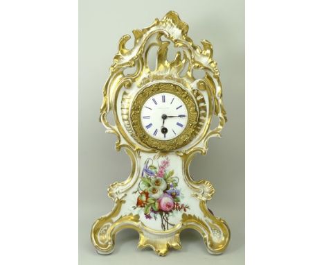 A French, Leroy a Paris, porcelain cased mantel clock, late 19th century, enamel dial bearing Roman numerals, the rococo scro