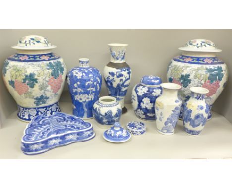 Two boxes of oriental blue and white china including ginger jars, vases and a pair of table lamp bases 