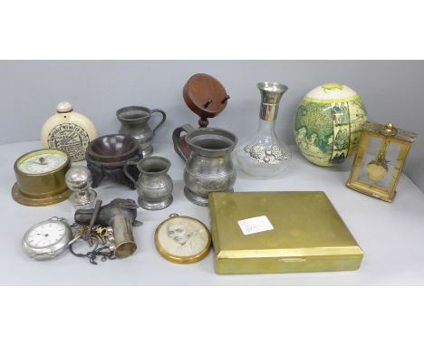 A Smiths brass barometer, pocket hot water bottle, brass clock, three pewter mugs, pocket watch a/f, watch keys, brass cigare