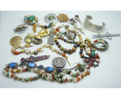 A collection of Scottish style jewellery, a St. Justin bangle, etc. 