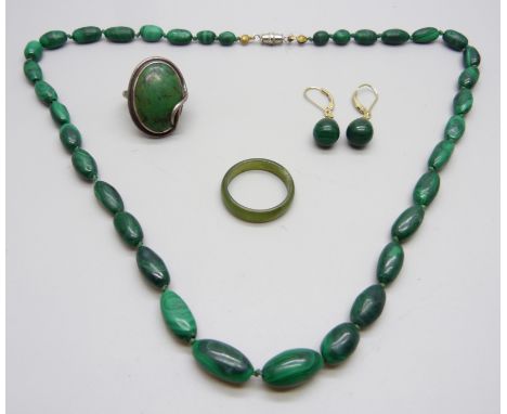 A malachite necklace, pair of earrings, a silver and malachite ring, G, and a jade ring, X, (jade ring a/f) 