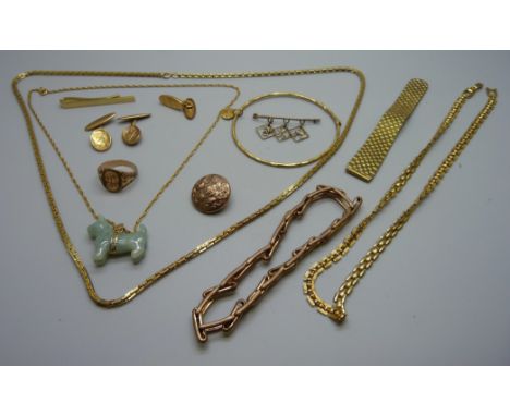 Gold-tone jewellery and a jade dog pendant 