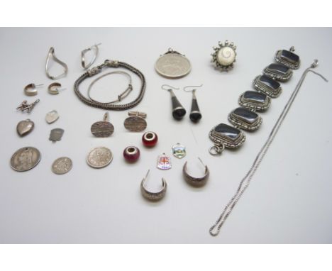 A silver ring, two bracelets, a crown in a silver mount, other coins, a pair of 925 silver cufflinks marked Germany, charms, 
