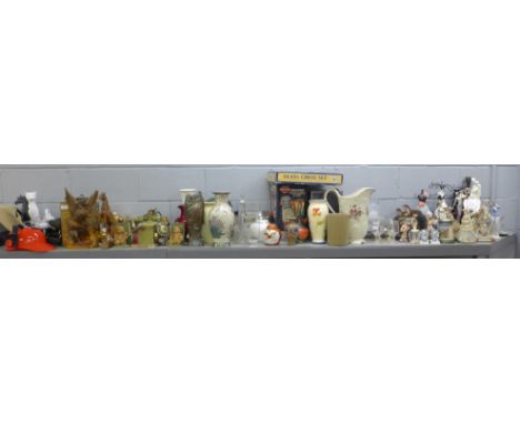 A collection of glassware, figures including Royal Doulton, Coalport, carved wooden figures, glass chess set, jugs, etc. **PL