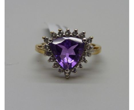 A silver gilt amethyst and white topaz ring, R/S 