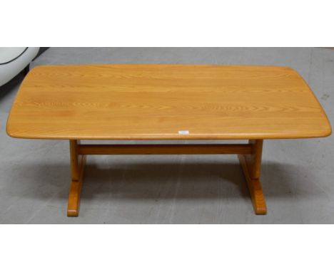 A 51" ERCOL LIGHT OAK COFFEE TABLE    