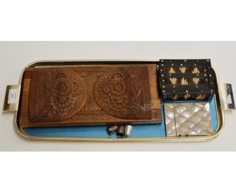 A TRAY CONTAINING A VICTORIAN MOTHER OF PEARL CARD CASE, A SMALL PORCUPINE QUILL BOX, A WOODEN BOOK TROUGH &amp; 3 VARIOUS TH
