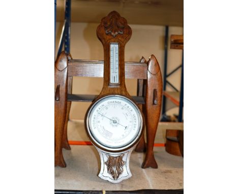 AN OAK CASED COMBINATION BAROMETER THERMOMETER    
