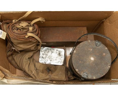 A WWII Russian machine gun ammunition box with linked metal belt; a British officer's bedroll; a large Thermos flask and a pi