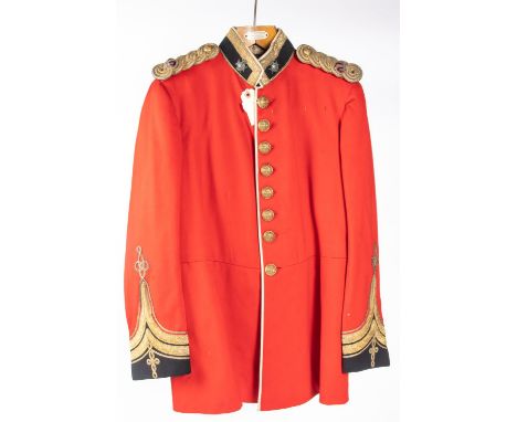 A Royal Sussex Regiment post 1902 scarlet tunic, fine silvered and enamel collar badges, brass regimental buttons, bullion cr
