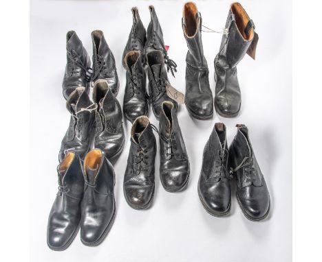 5 pairs of army boots, 2 other pairs of ankle boots, and a pair of firemans boots. GC £30-40 