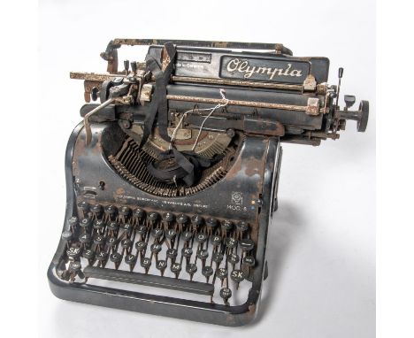 A large Third Reich period typewriter, marked "Olympa Buromasi Neu Werke A.G. Erfurt" needs cleaning. GC £30-40 