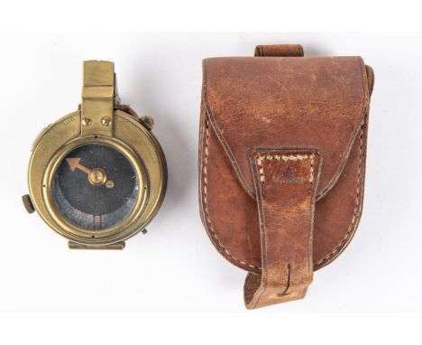 A WWI Verner's Pattern Mk VIII prismatic marching compass, by E Koehn, Geneva, with broad arrow and date 1918, and with MOP d