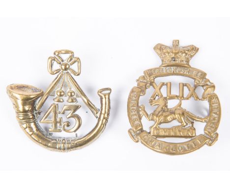 Pre 1881 brass glengarry badges of the 43rd and 49th Regiments of Foot, (K&amp;K 498 &amp; 506), GC (both slightly worn). £60