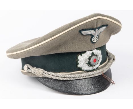 A Third Reich Army officers SD cap, alloy bullion insignia and cords, generally GC (peak patent crazed, sweatband torn in pla