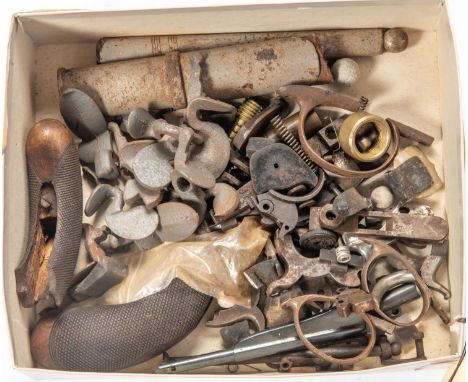 A quantity of antique pistol and revolver parts etc, including side hammer for 1855 Colt pocket revolver, Colt Navy revolver 