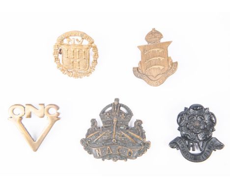 Five WWI cap badges: Optimists National Corps (K&amp;K 1651), Essex Volunteers Regt (K&amp;K 1617), Dublin Regiment N.V., bla