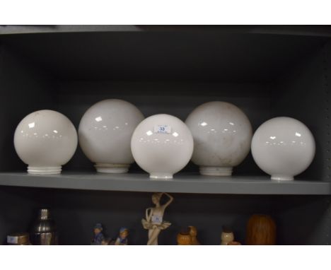 A selection of milk or opal glass light shades various sizes