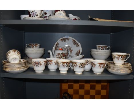 A vintage Colclough bone china part dinner service having transfer floral motif pattern including sandwich plate ,cups and sa